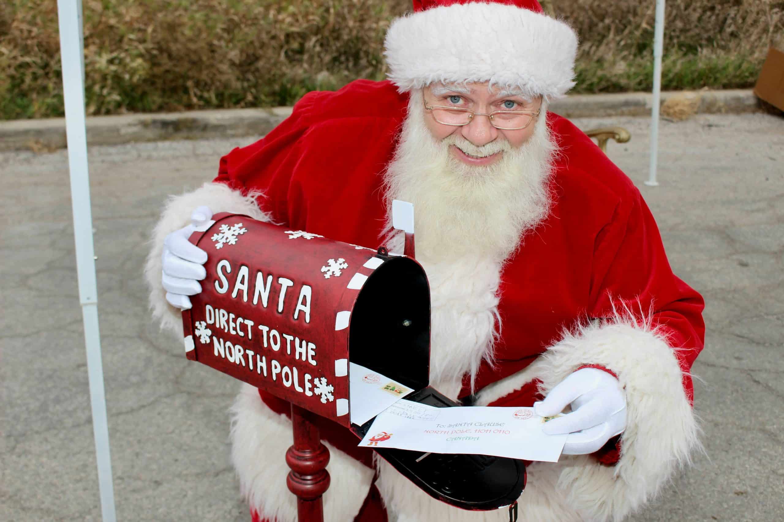 santa checking his mail box